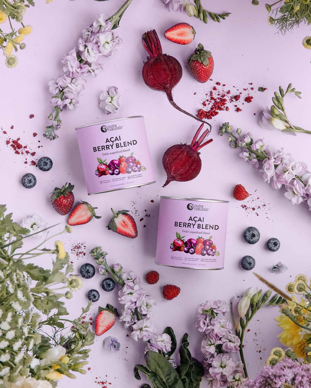 Acai Berry Blend flat lay in a purple background