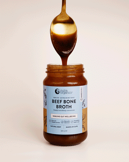 A Gif image of a teaspoon coming out of a jar of beef bone broth concentrate natural beef