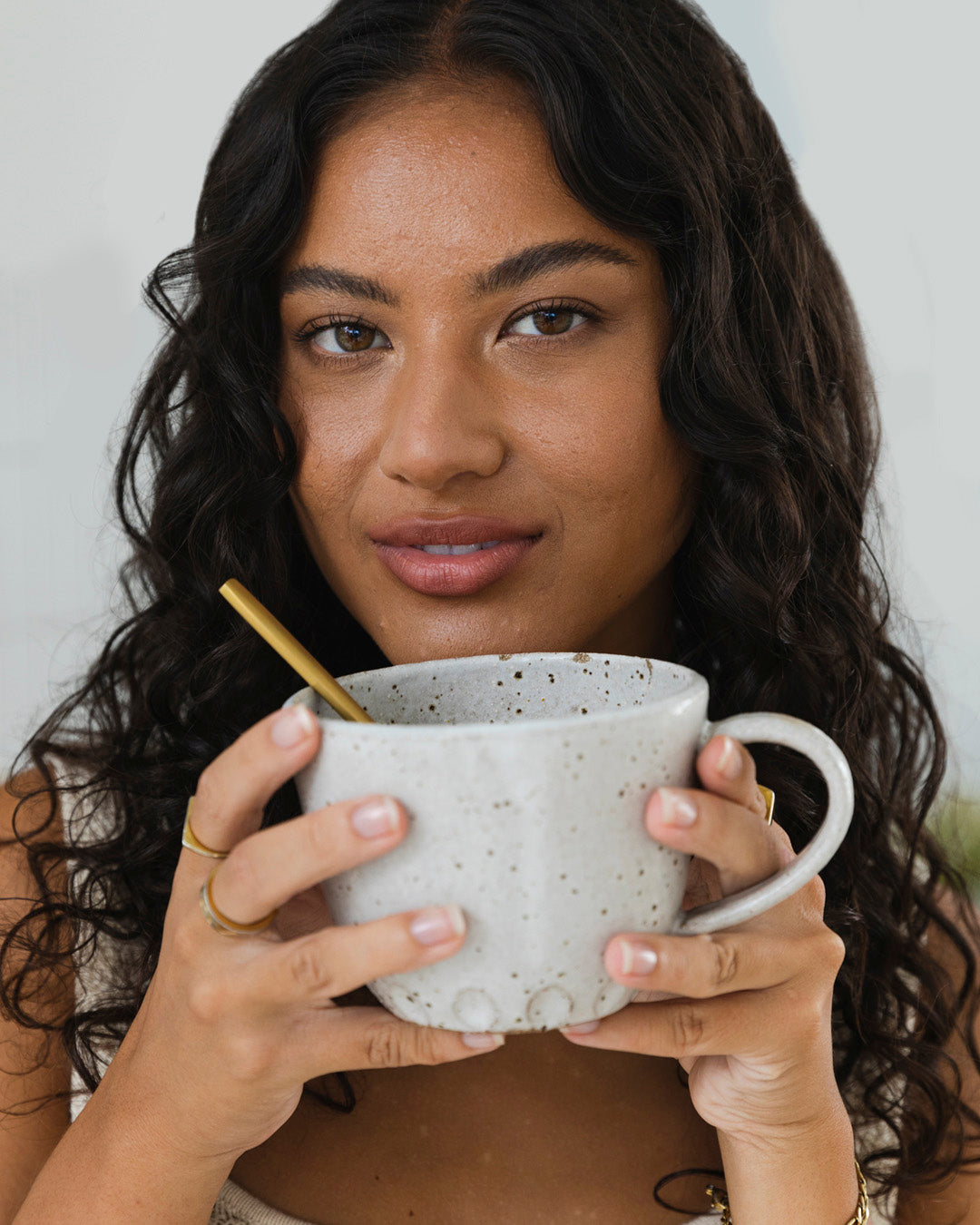 Woman holding a cup