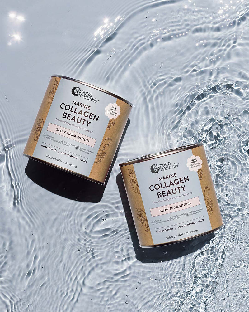 Two cans of Marine Collagen Beauty powder arranged on rippling water. 