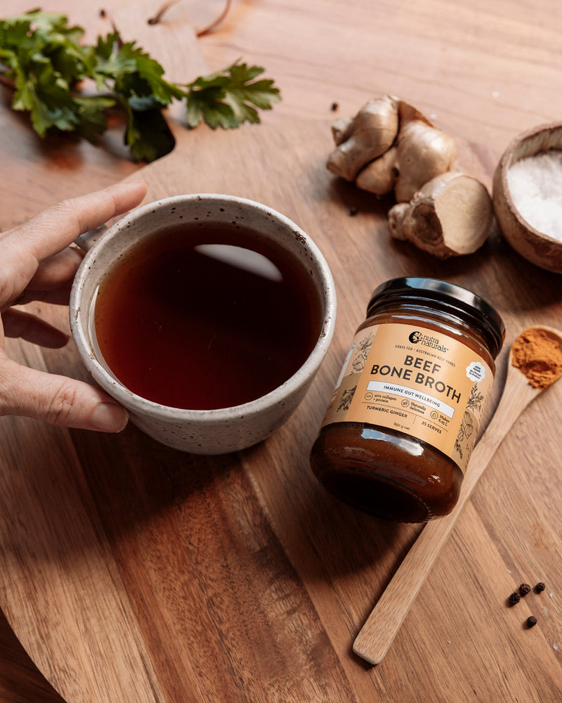 Beef bone broth turmeric ginger in a cup