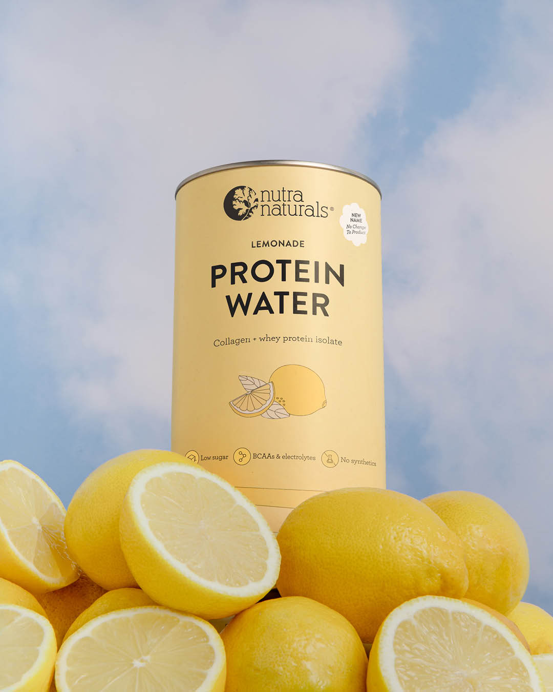 Can of Nutra Naturals lemonade protein water with lemons against a blue sky background