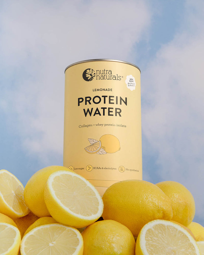 Can of Nutra Naturals lemonade protein water with lemons against a blue sky background