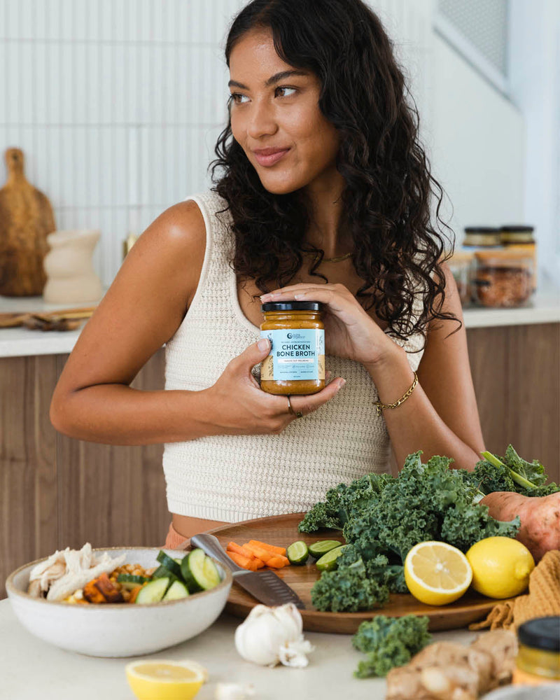 Lady holding Chicken Bone Broth
