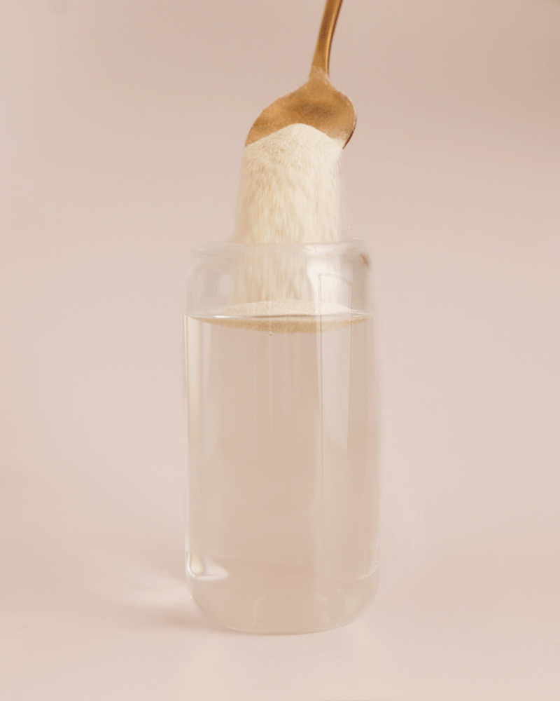 GIF: Protein Water Lemonade powder poured into a glass